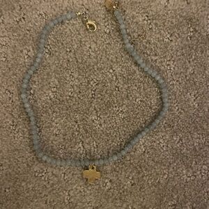 Susan Shaw Aly’s Cross Necklace